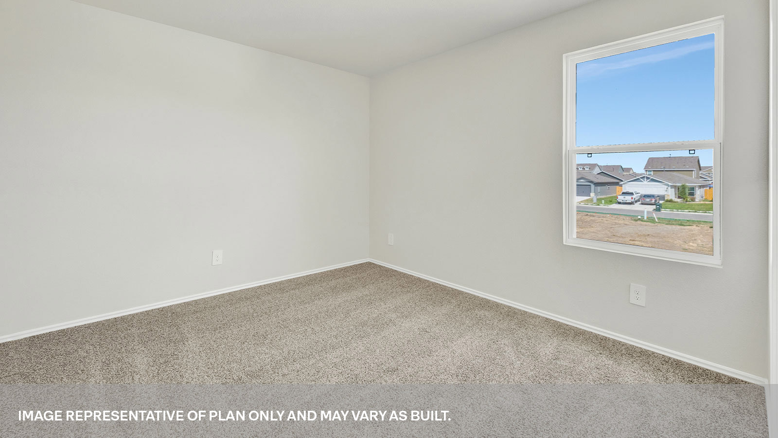 Secondary bedroom with carpeting and one window.