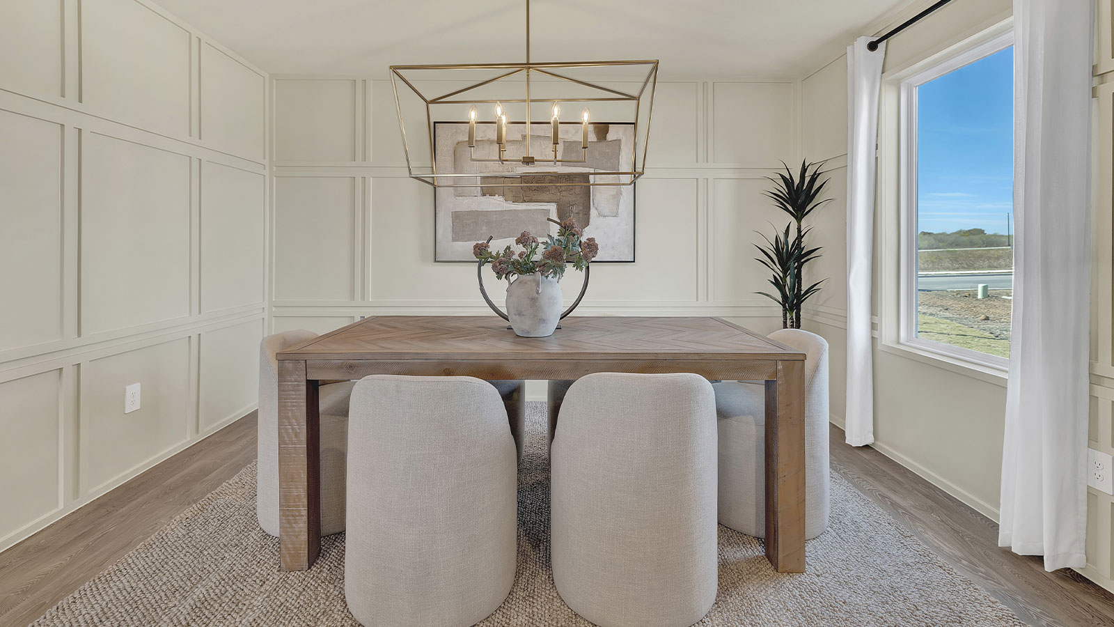 Dining room with vinyl flooring and one window.