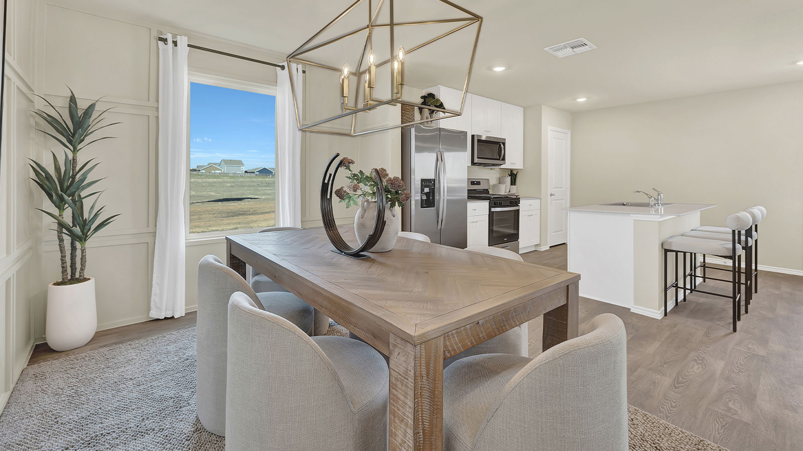 Dining room opening to the kitchen.