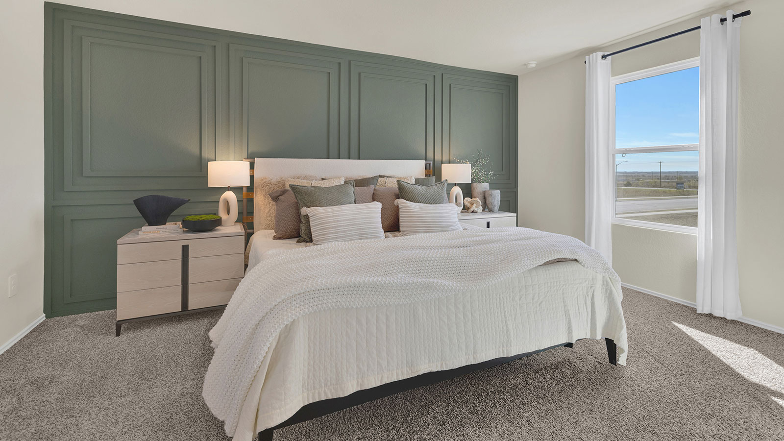 Bedroom with carpeting and one window.