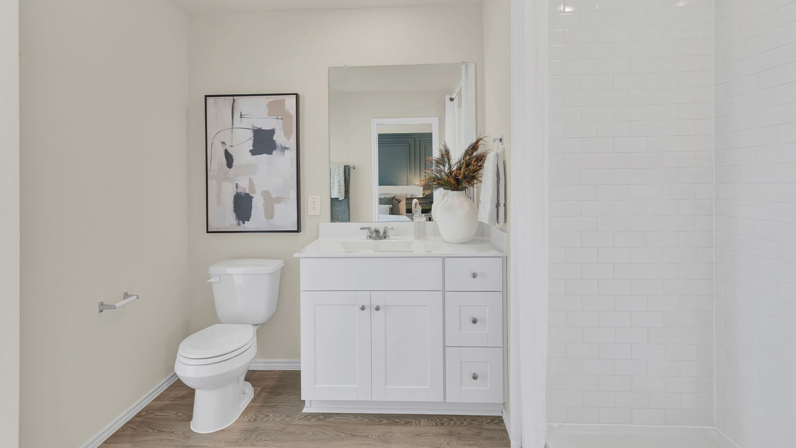 Main bathroom toilet and vanity.