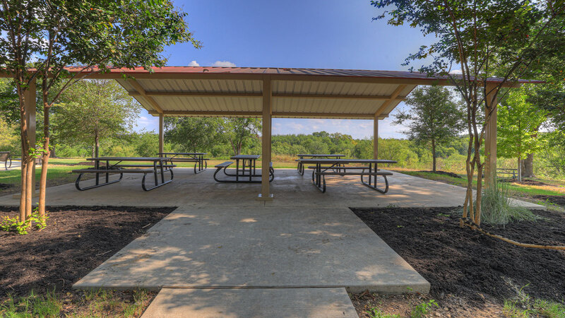 Sunset Oaks community pavilion with picnic tables.