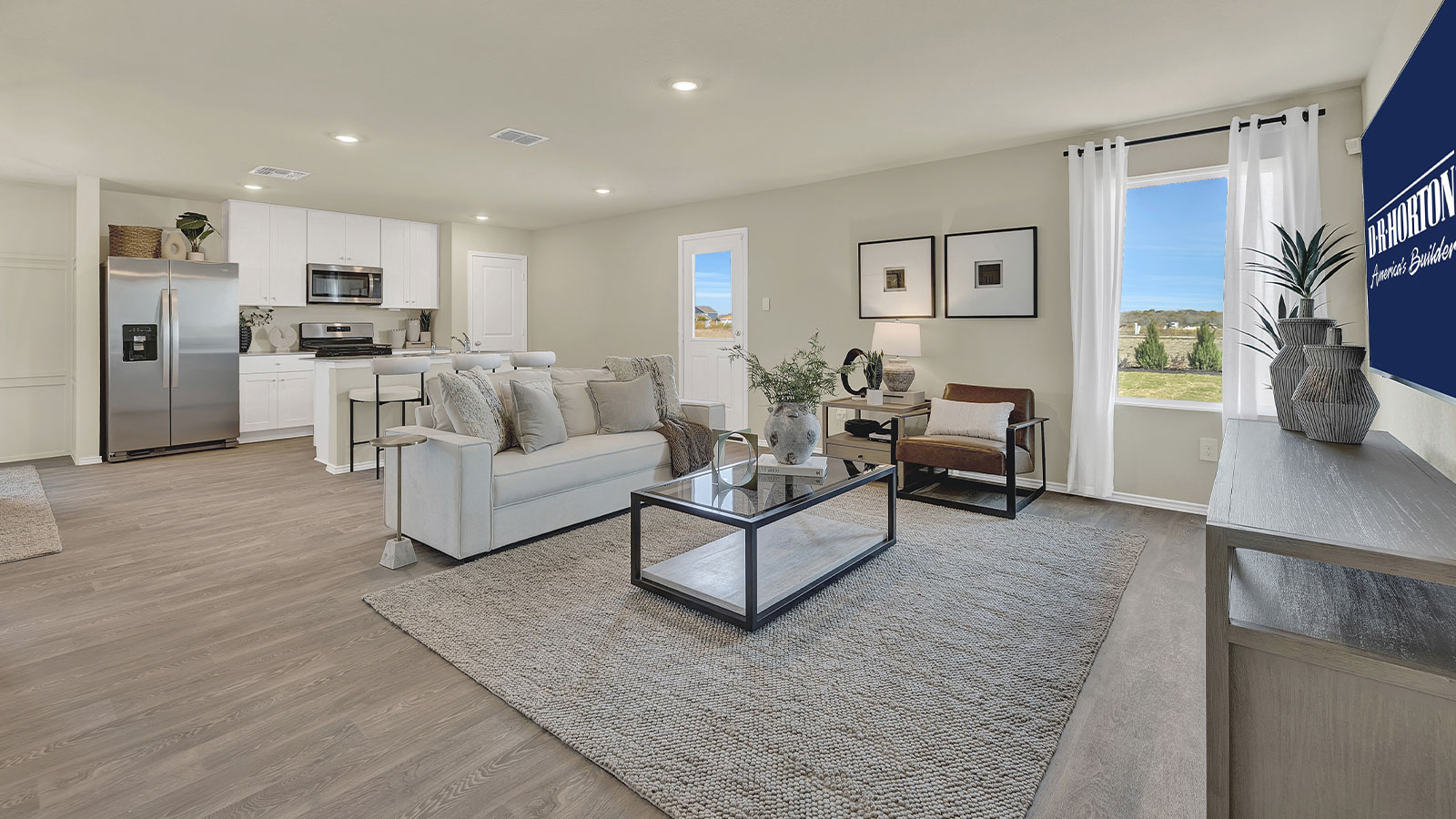 Living room opening to the kitchen.