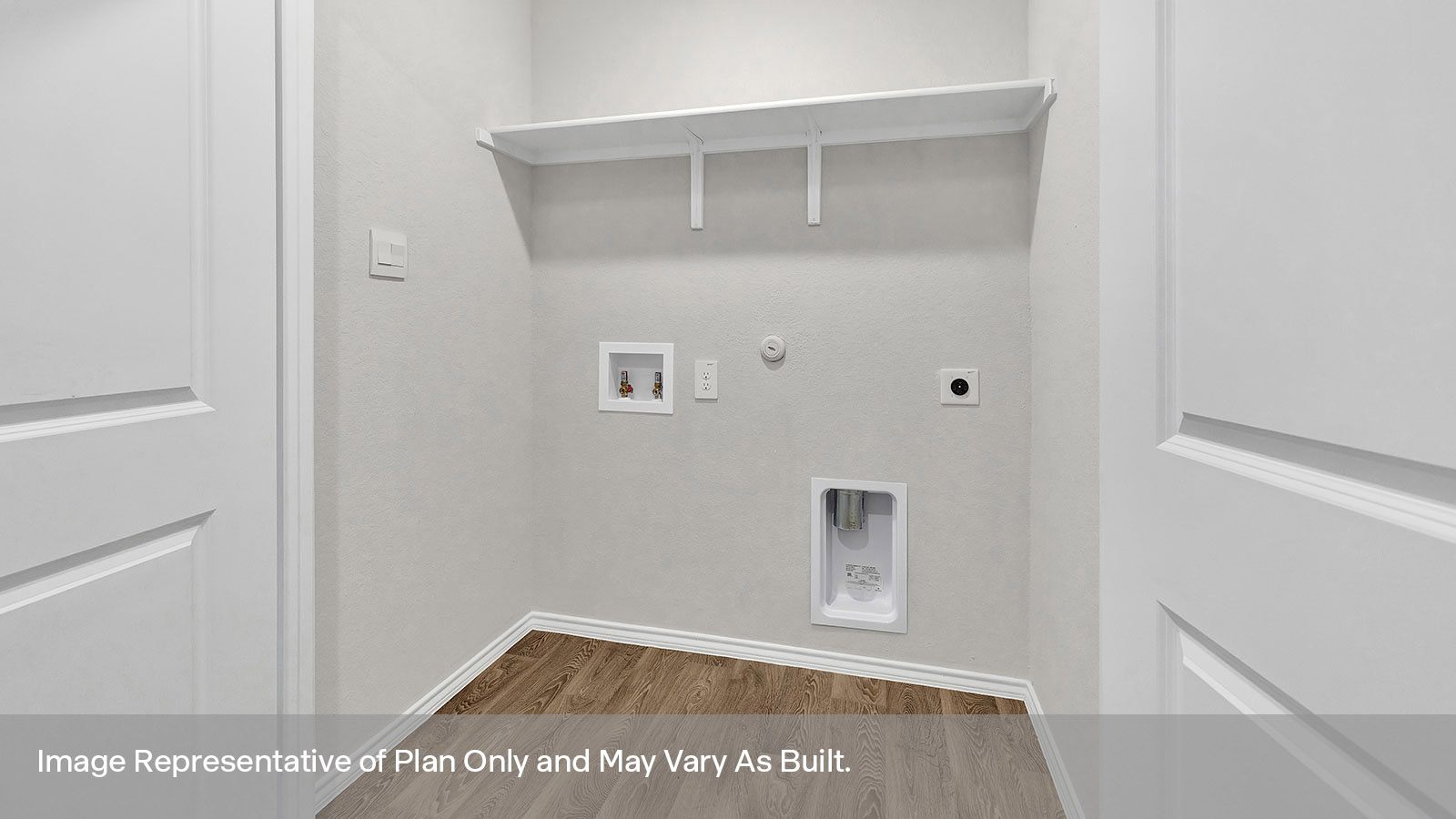 Laundry room with washer/dryer connection and wooden shelving.