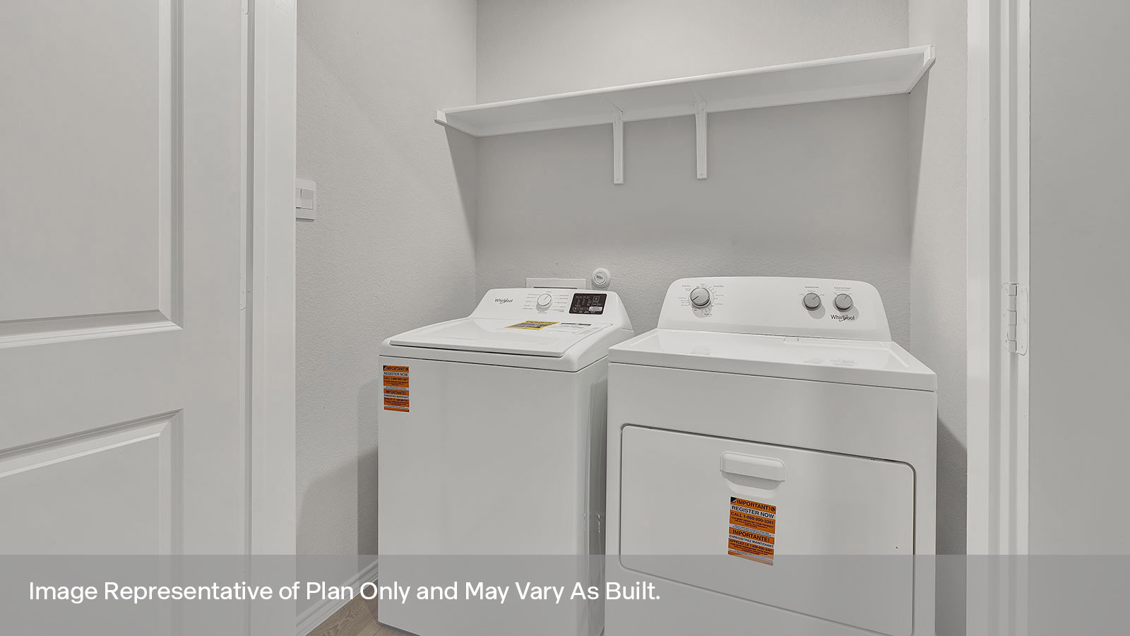Laundry room with washer/dryer connections and wooden shelving.