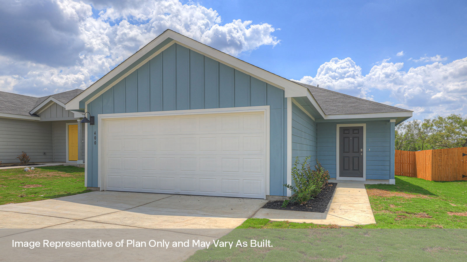 Siding Exterior, Garage Forward with a wrap around Sidewalk