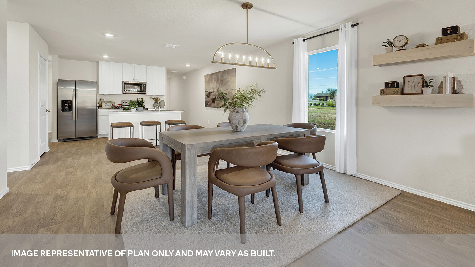 Dining room and living room featuring two windows and a door to the back yard