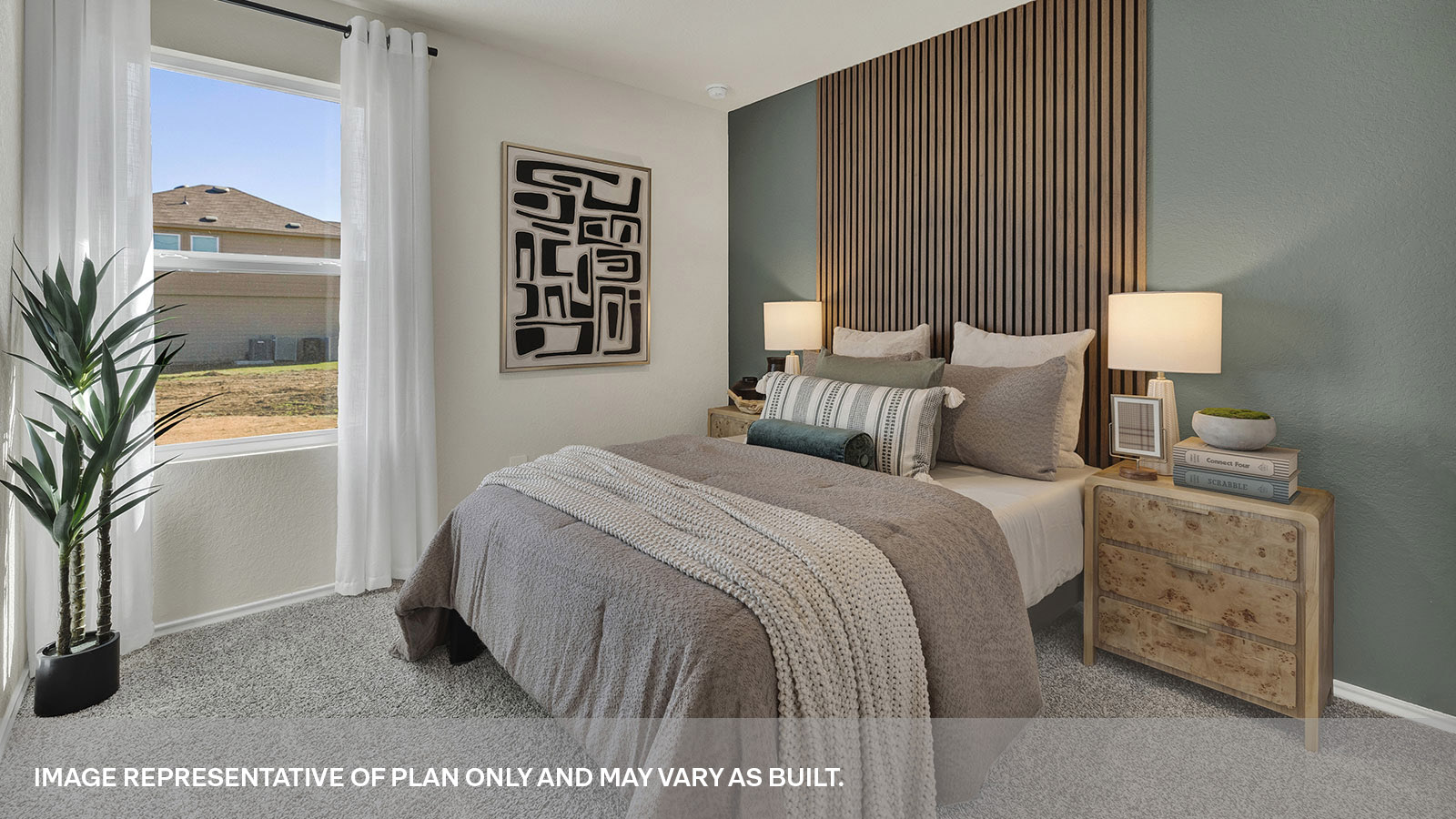 Bedroom with carpeting and one window.