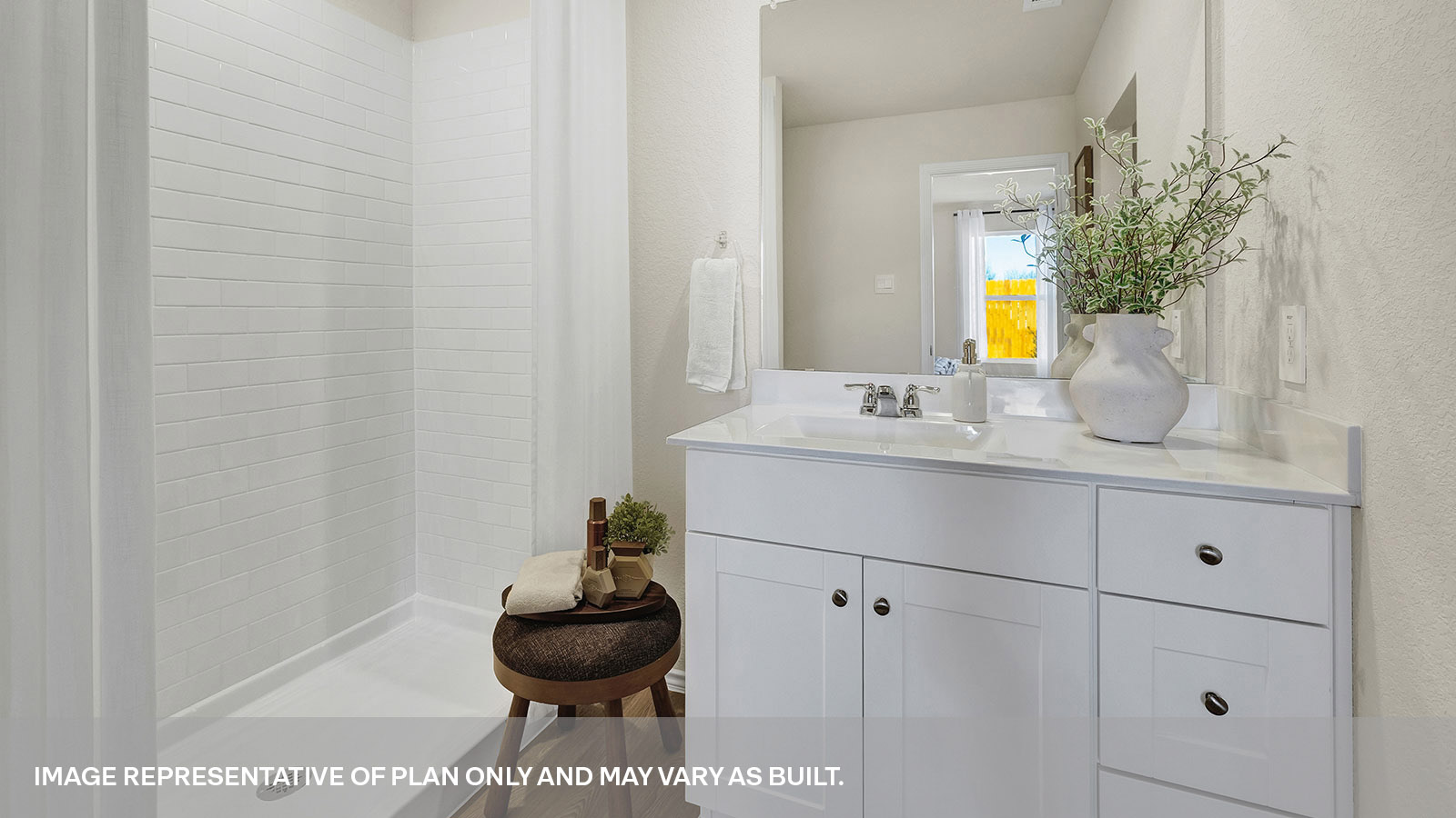 Main bathroom with single-sink vanity.