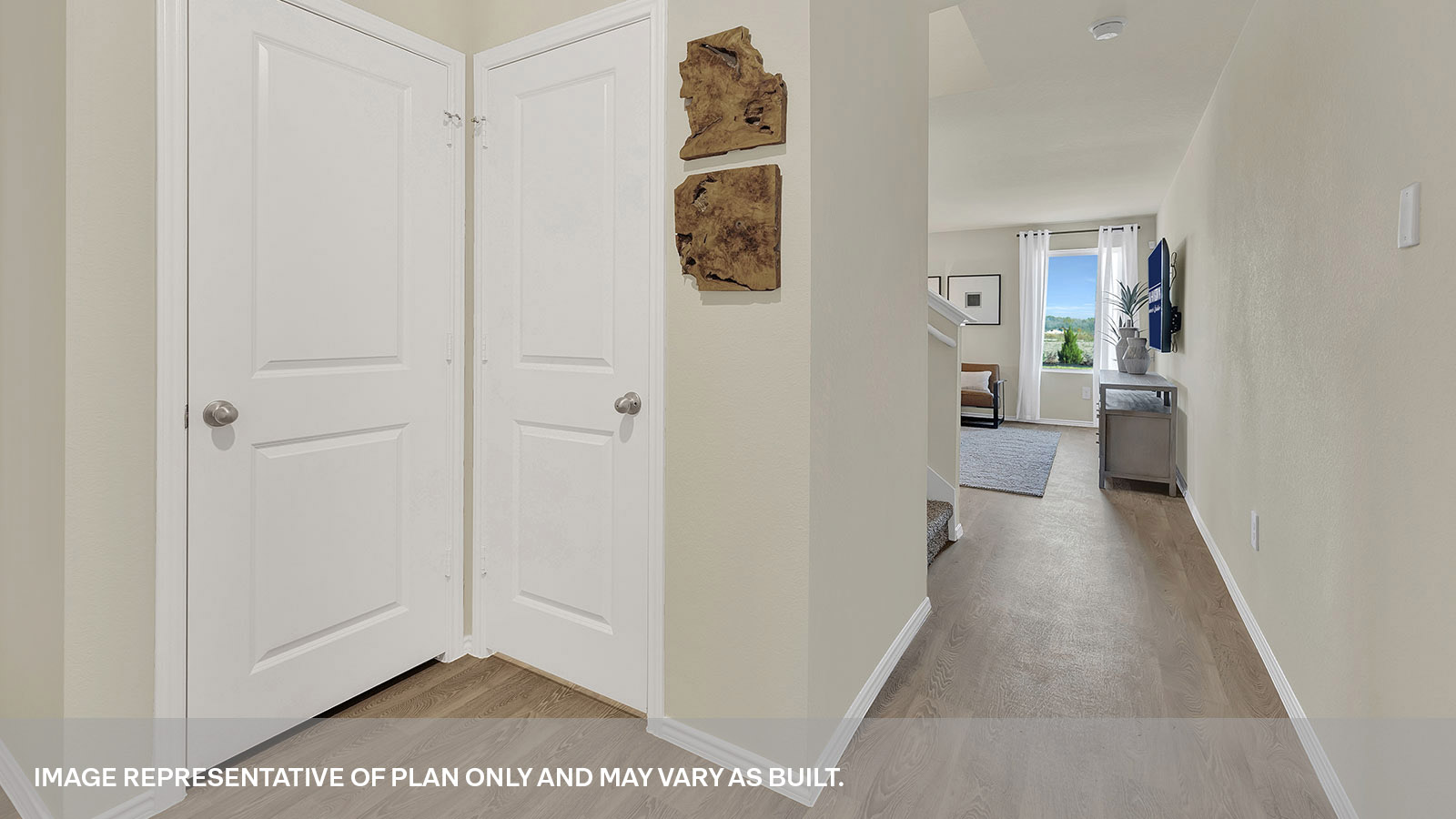 Entryway showing the door to the power room and garage