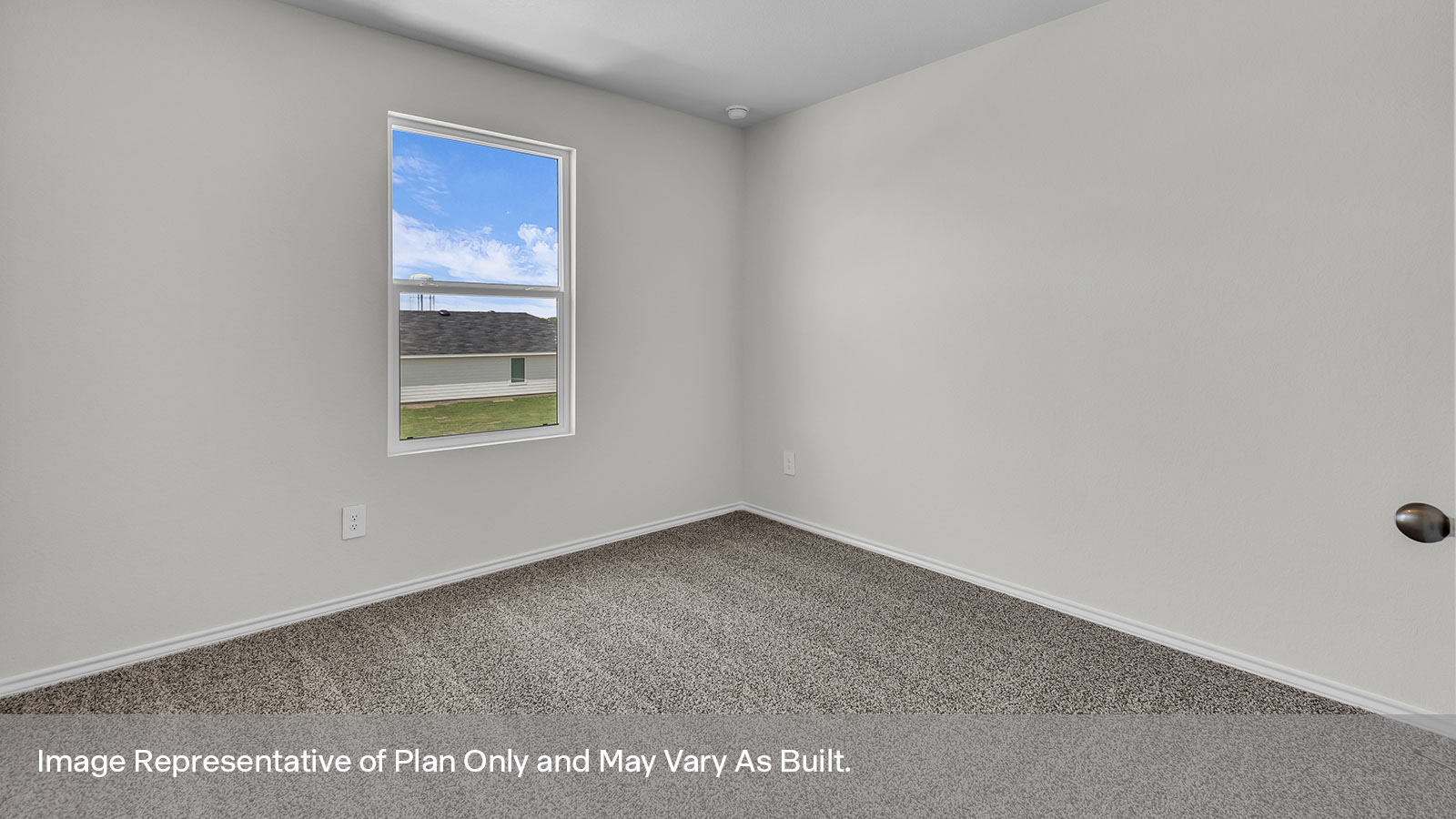 Secondary bedroom with carpeting and one window.