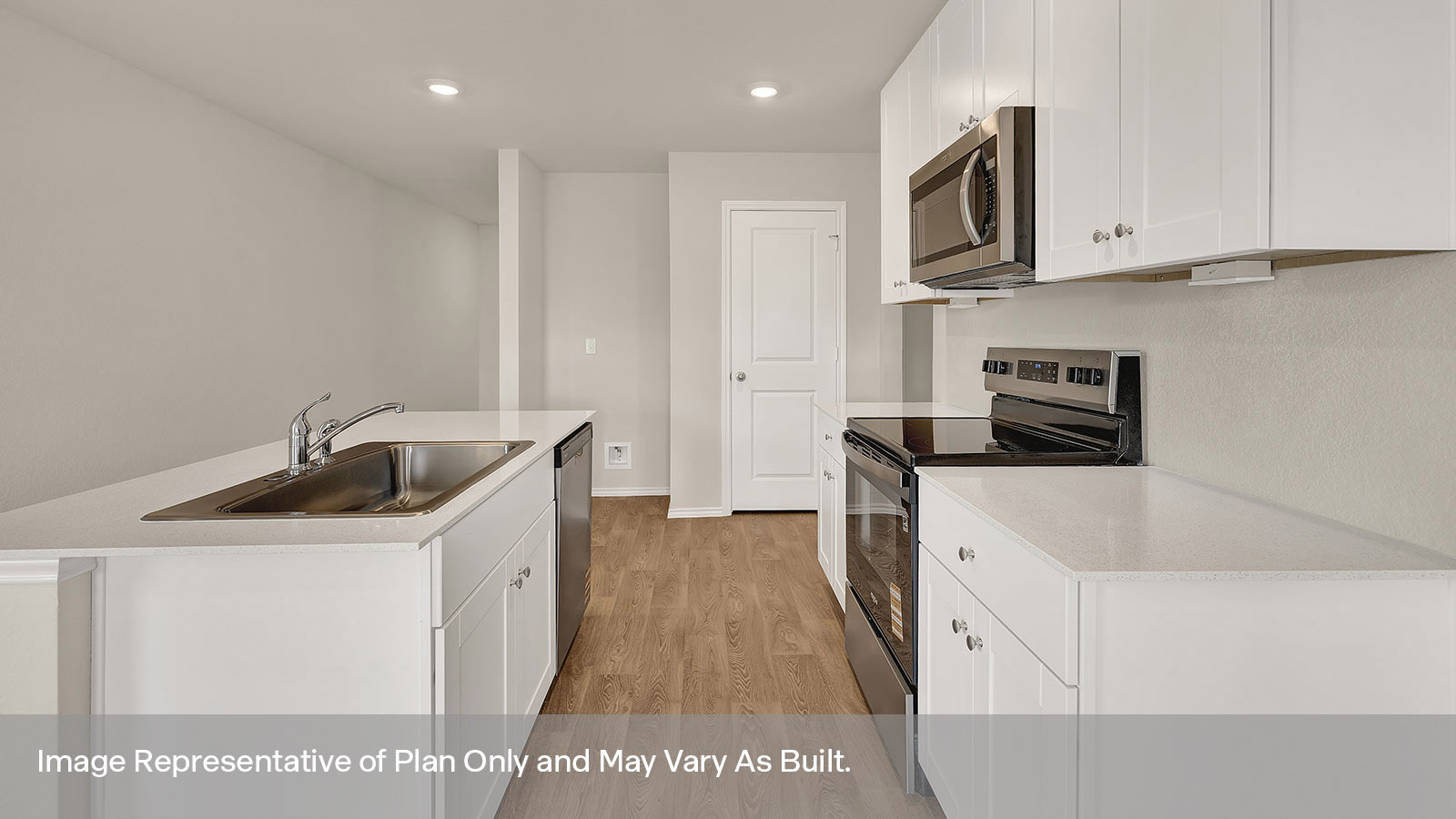 Kitchen with stainless steel appliances.