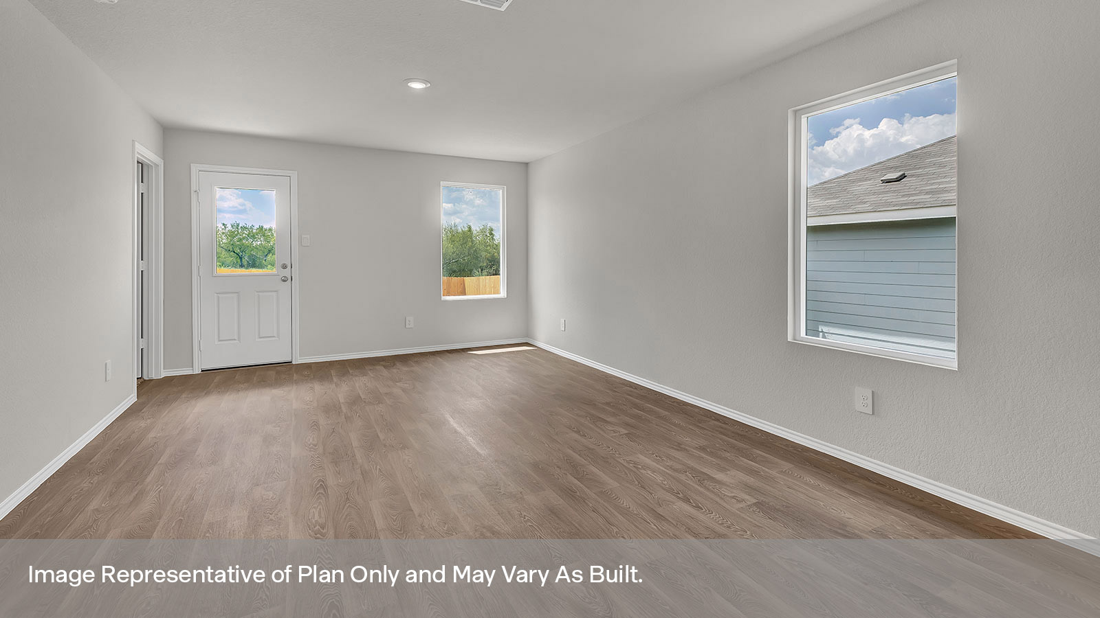 Living room with vinyl flooring, 2 windows, and a half lite exterior door.