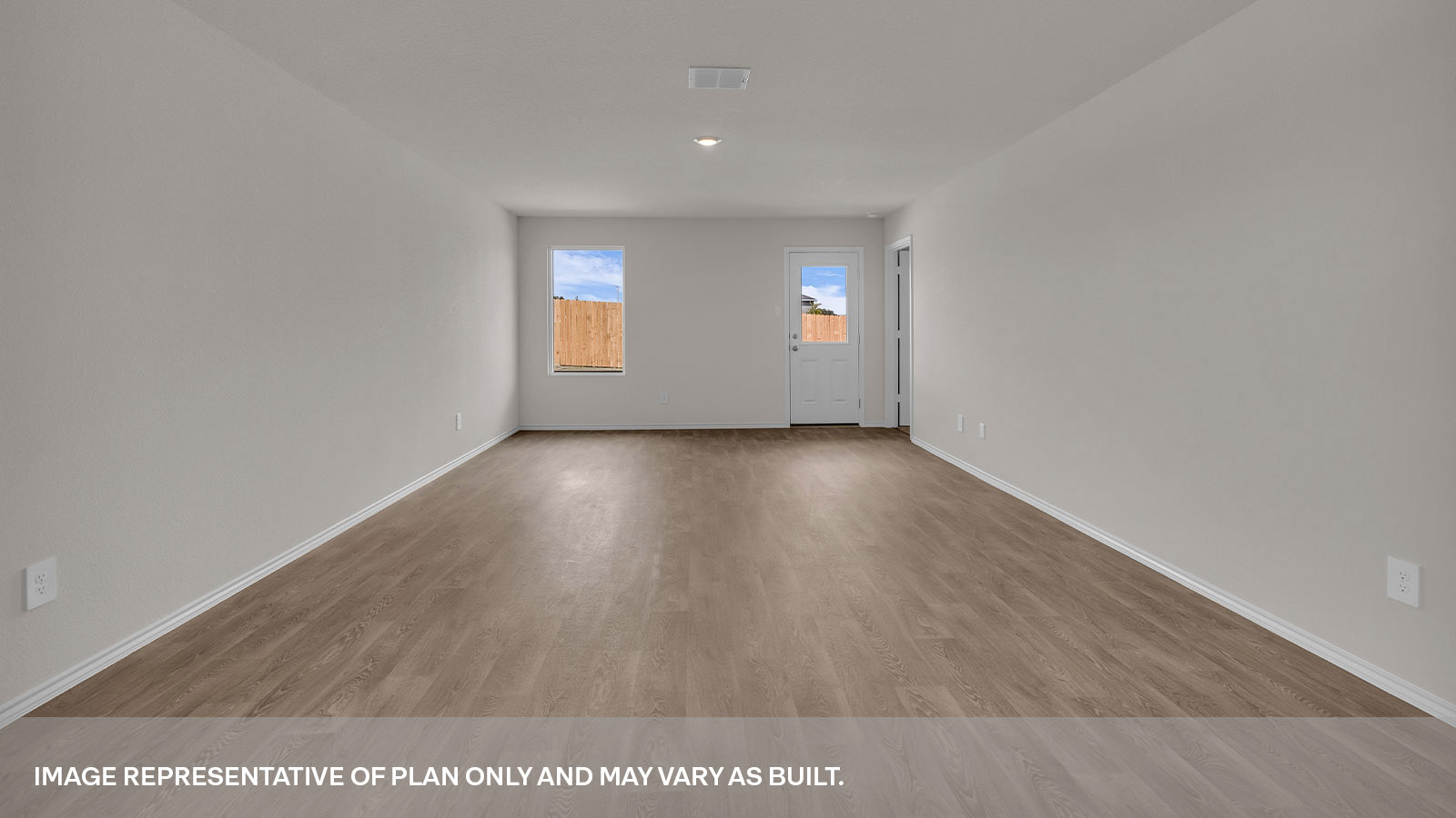 Living room with vinyl flooring, 2 windows, and  half lite exterior door.