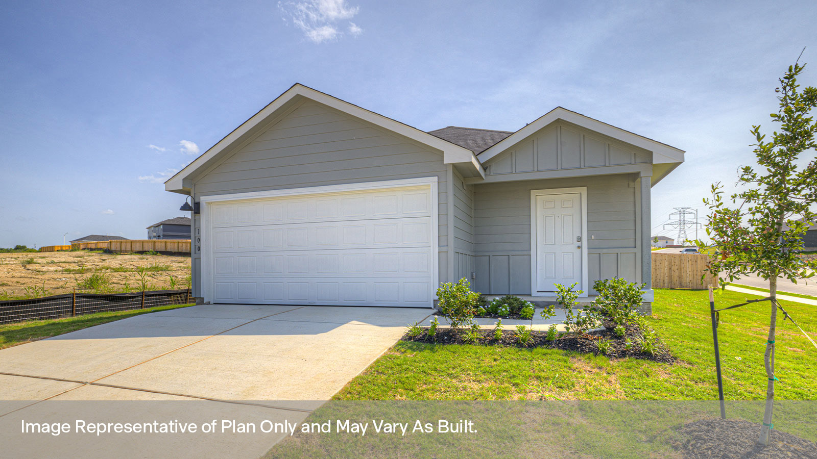 Single-story farmhouse with 2 car garage.