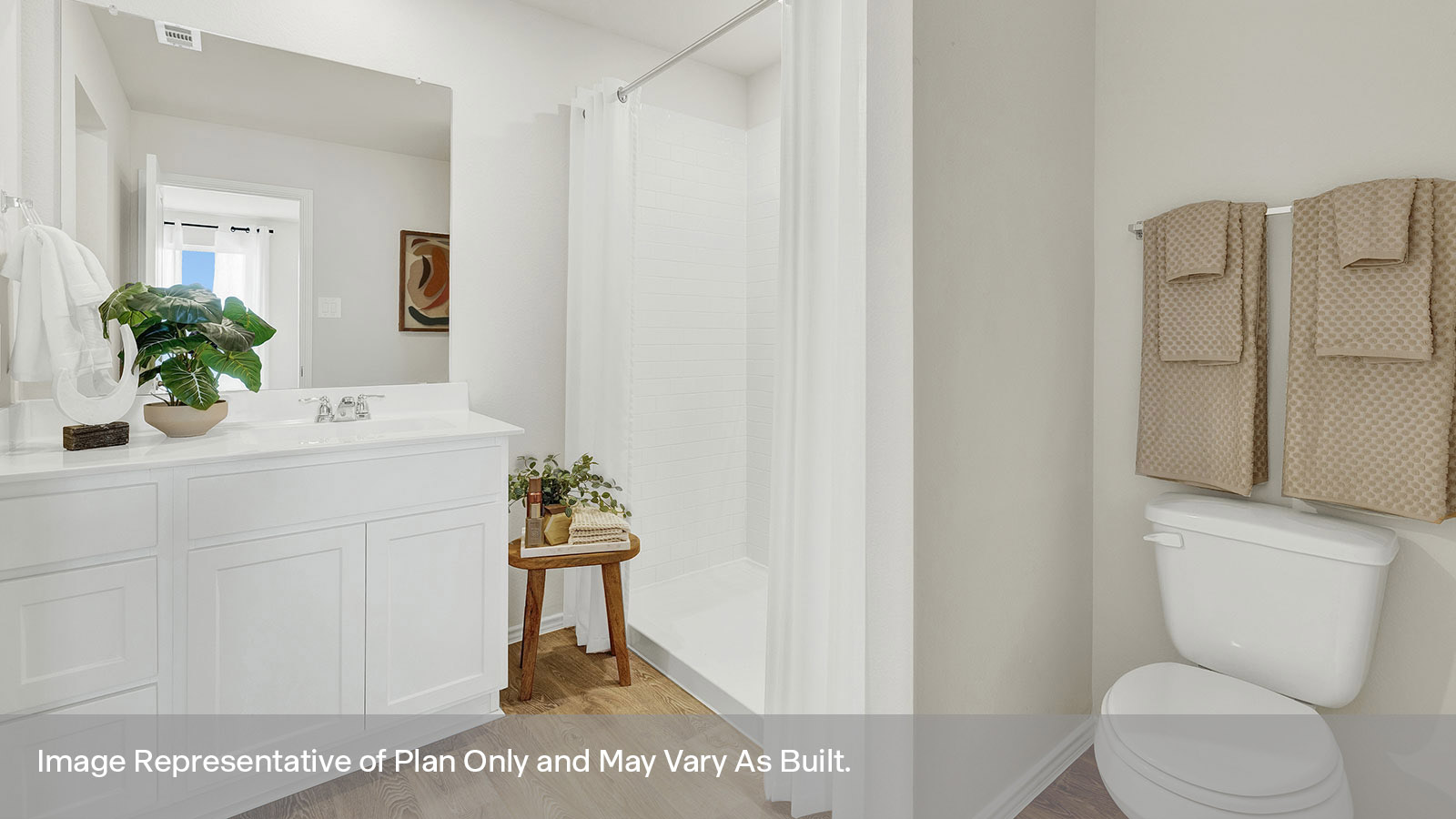 Main bathroom with shower, toilet, and sink.