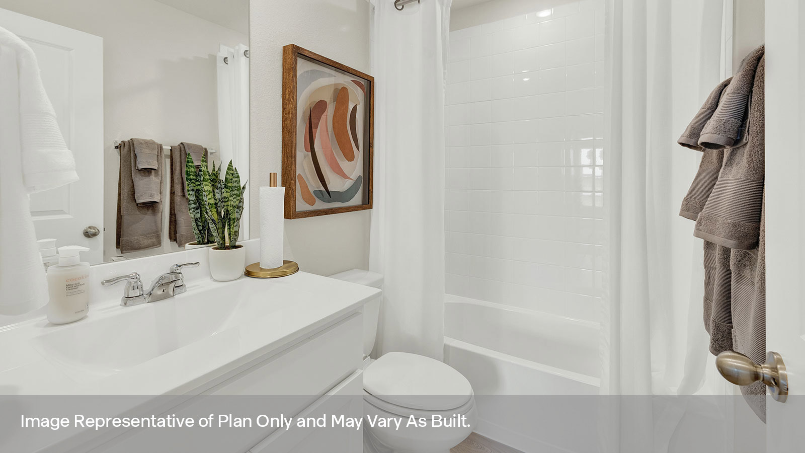 Hall bathroom with single-sink vanity, toilet, and tub.