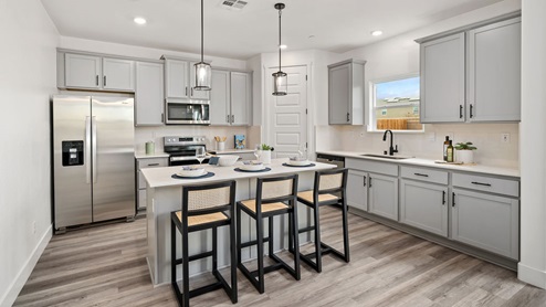 Sparrow kitchen with shaker cabinets and counter seating