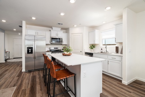 Kitchen with white shaker cabinets