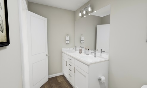 Main bathroom with white cabinets