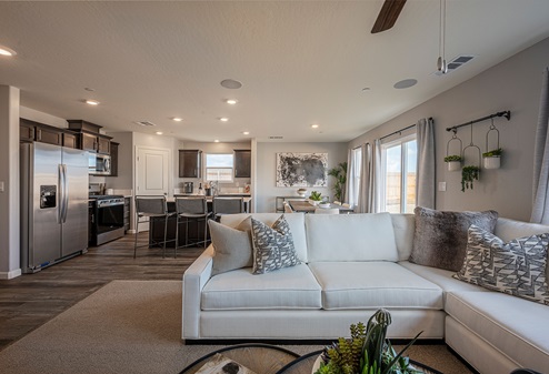 Interior photo of living room with couch and coffee table.