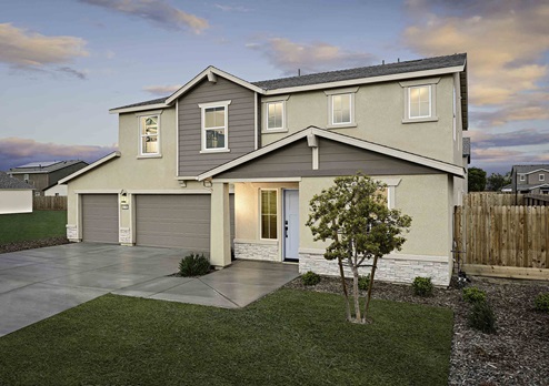 Monroe home exterior with 3-car garage