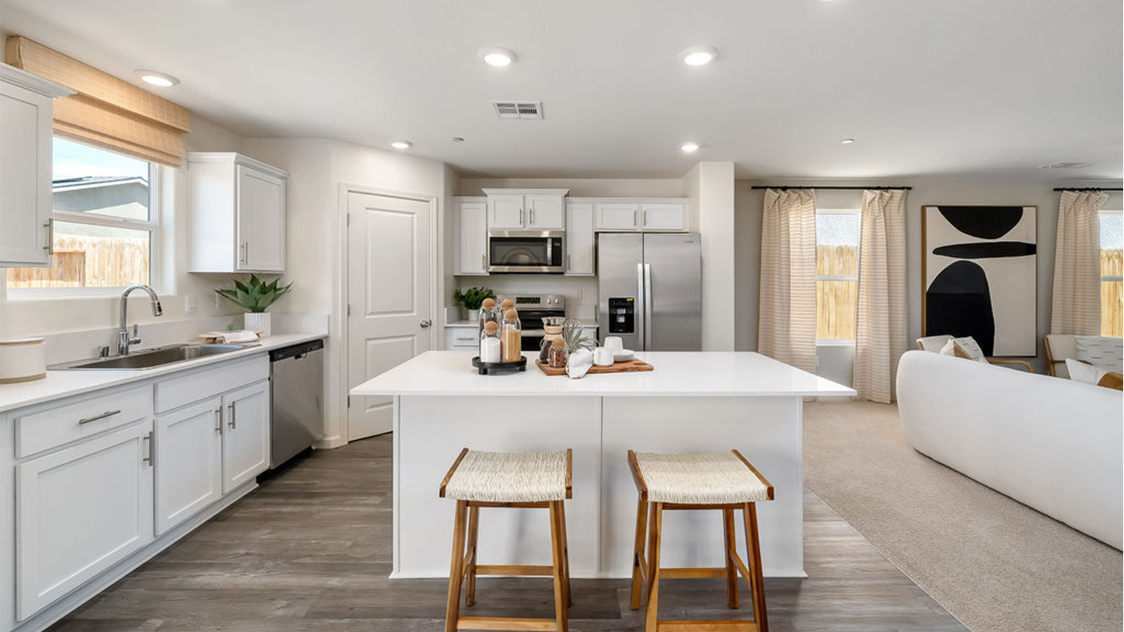 kitchen with island and barstools