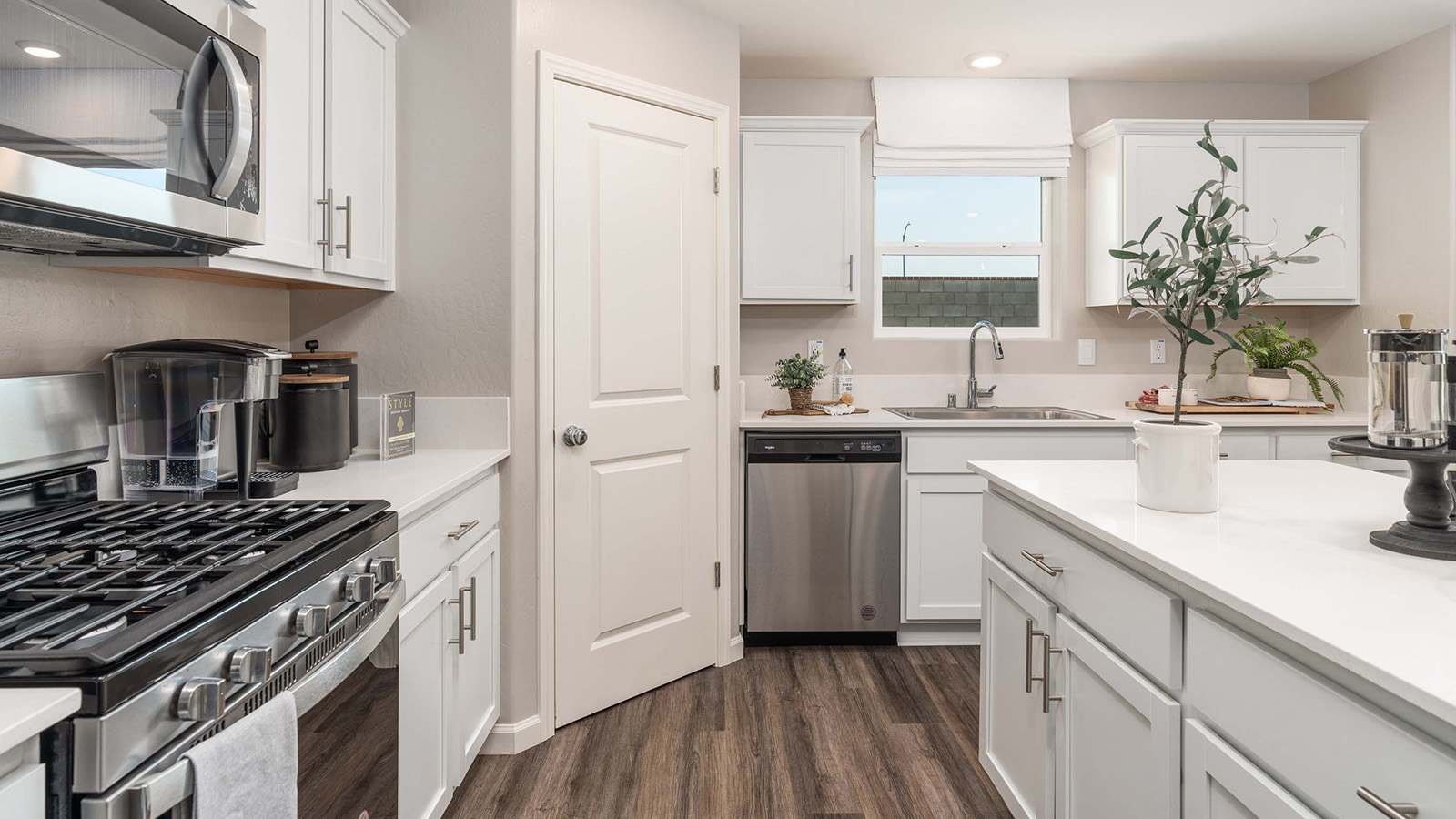 open concept kitchen with stainless steel appliances