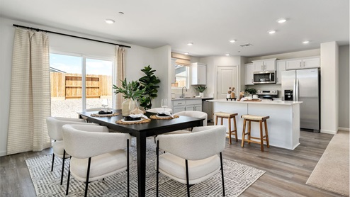 Dining room and kitchen in the coolidge model
