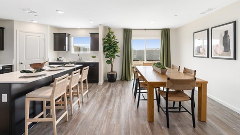 Photo of open concept dining room and kitchen area