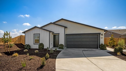 Exterior photo of one-story farmhouse style home