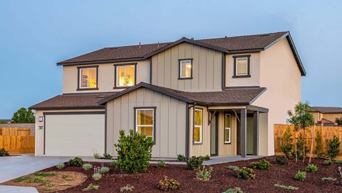 Exterior photo of two-story farmhouse style home