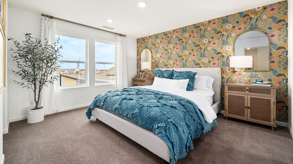 primary bedroom with accent wall