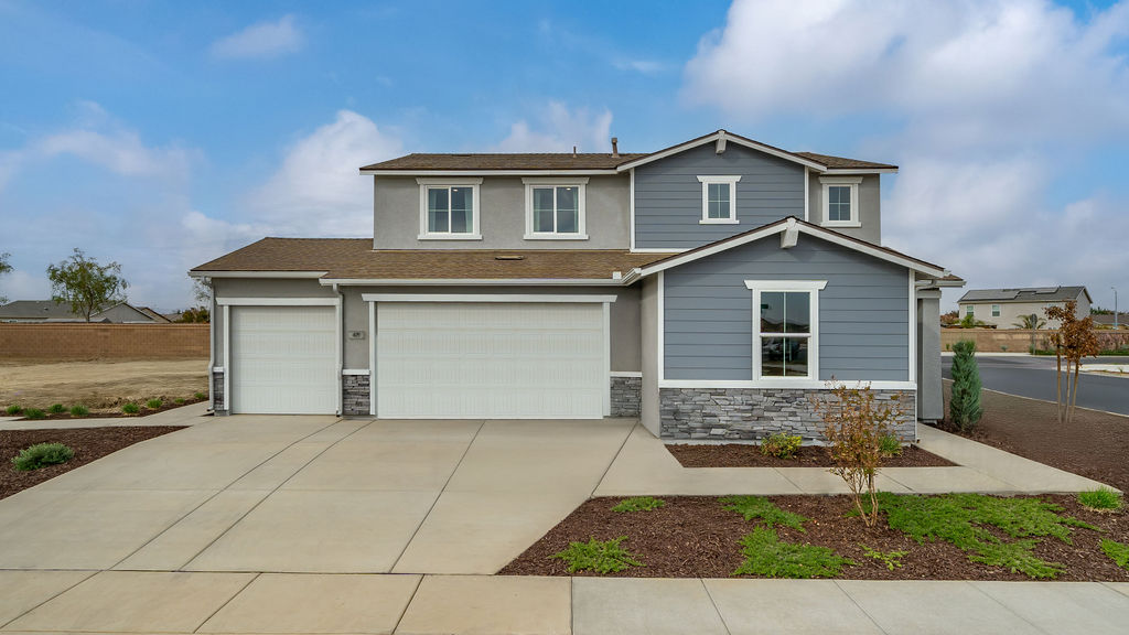 exterior of Sparrow floorplan with 3 car garage