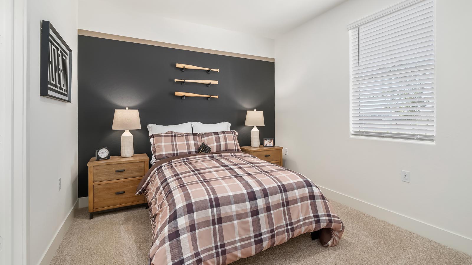 kid's bedroom with black accent wall