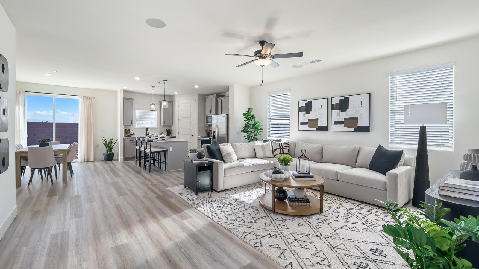 Open concept living space including living room, kitchen, and dining room