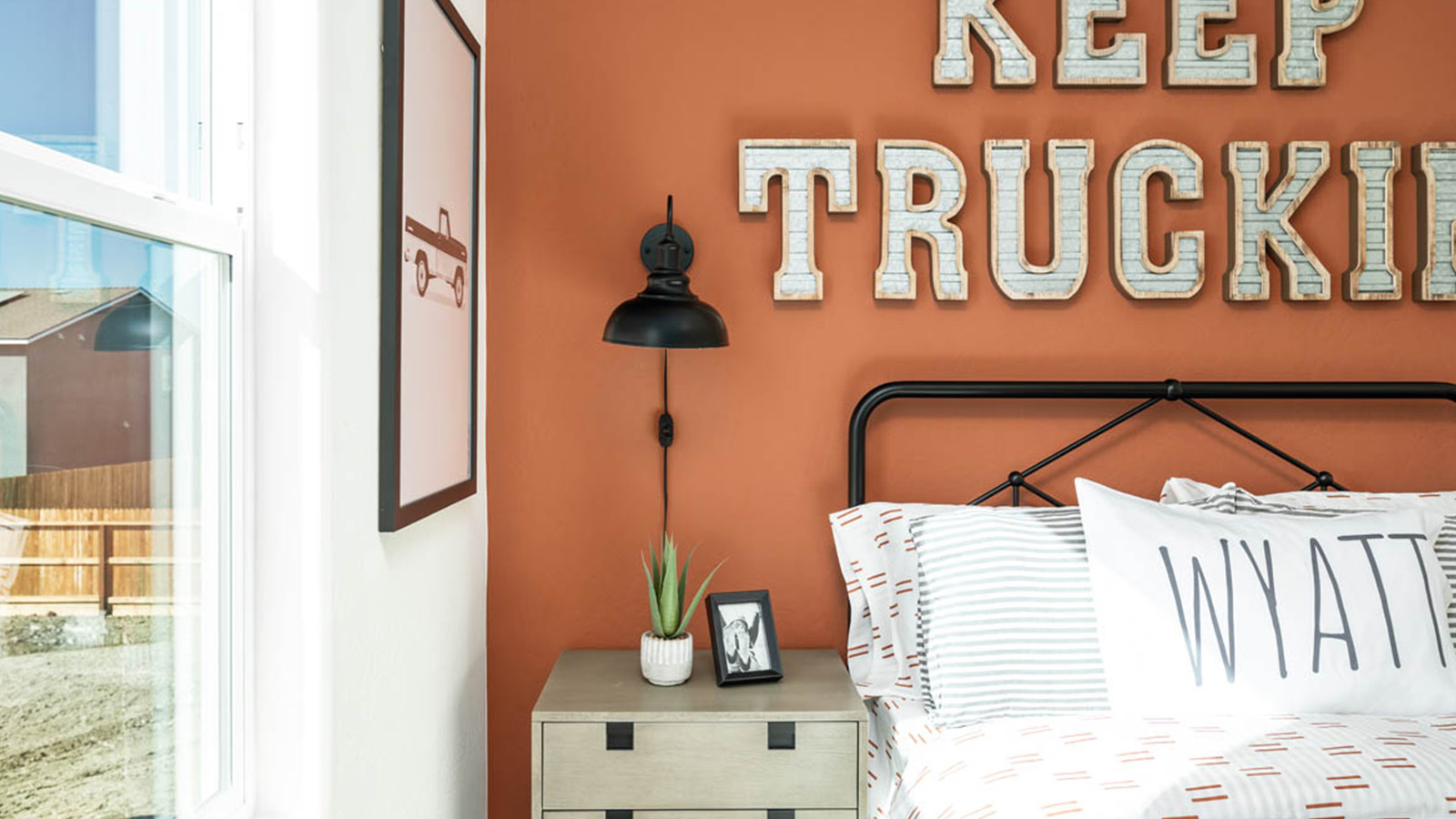 kid's bedroom with truck themed decor