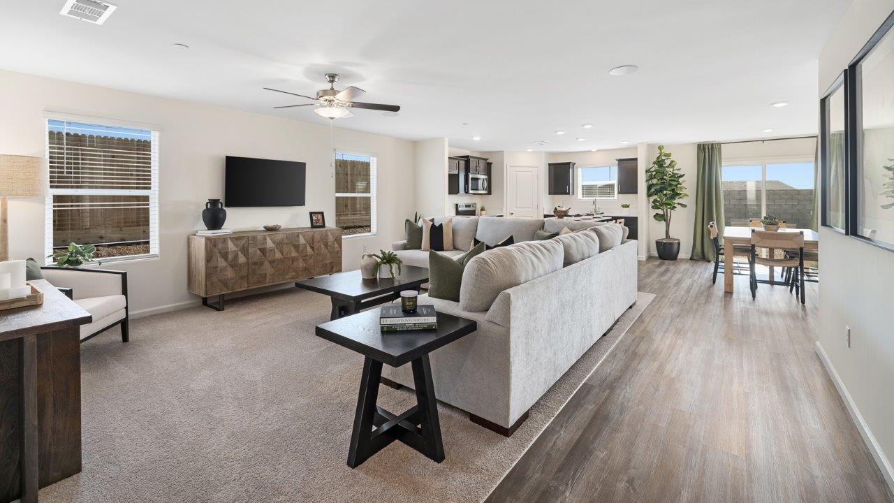 open concept living, kitchen and dining space