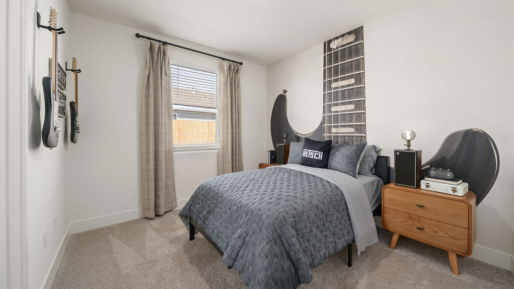 Bedroom with guitar wallpaper.