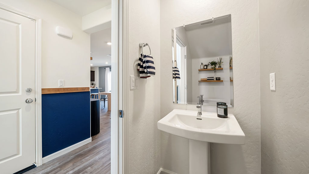 Bathroom with blue accents.