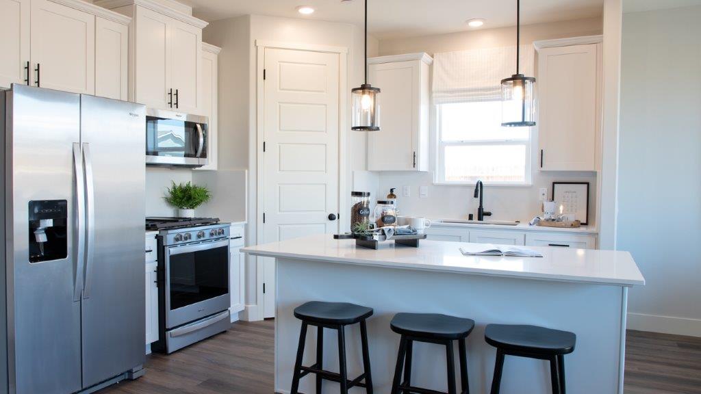 kitchen with light cabinets.