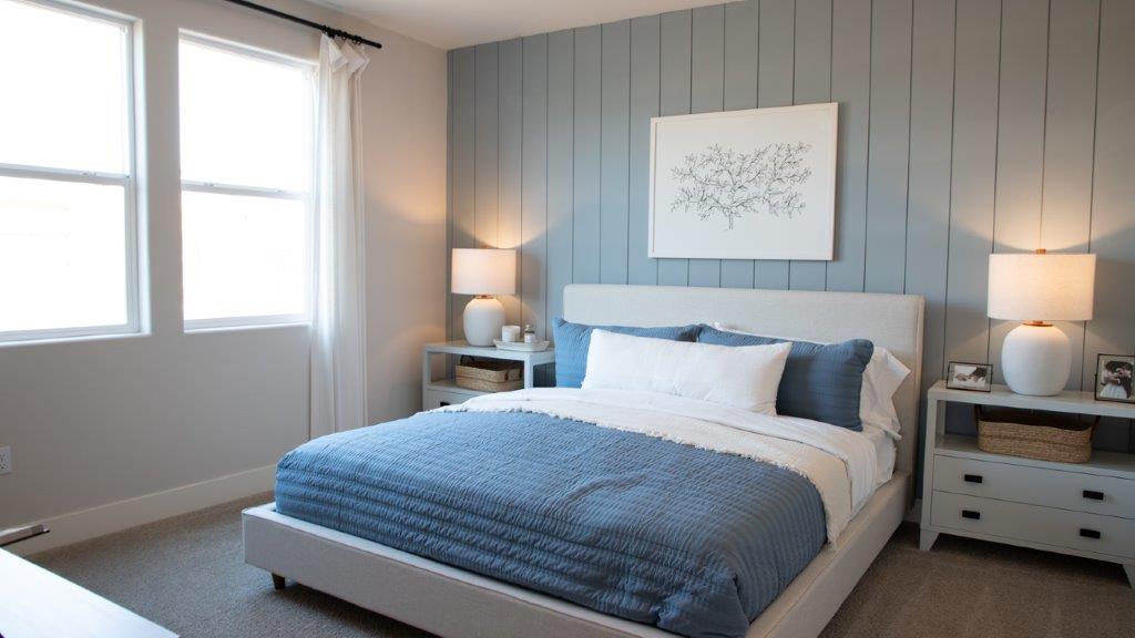 primary bedroom with blue accents.