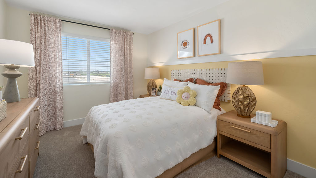 kids bedroom with white bedding.