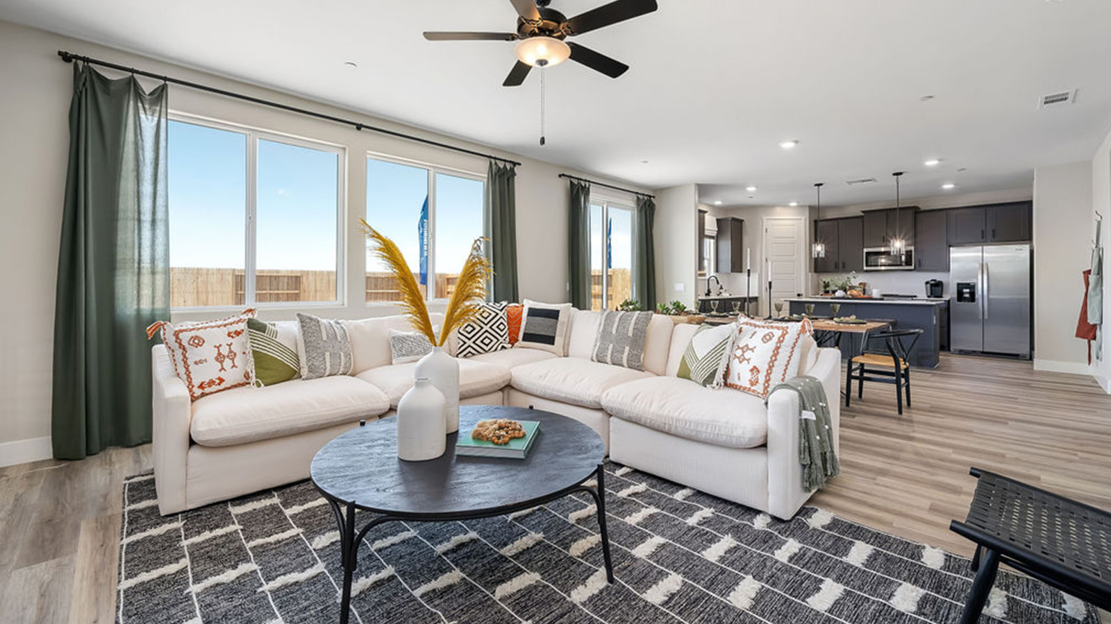 living room with tan sectional.