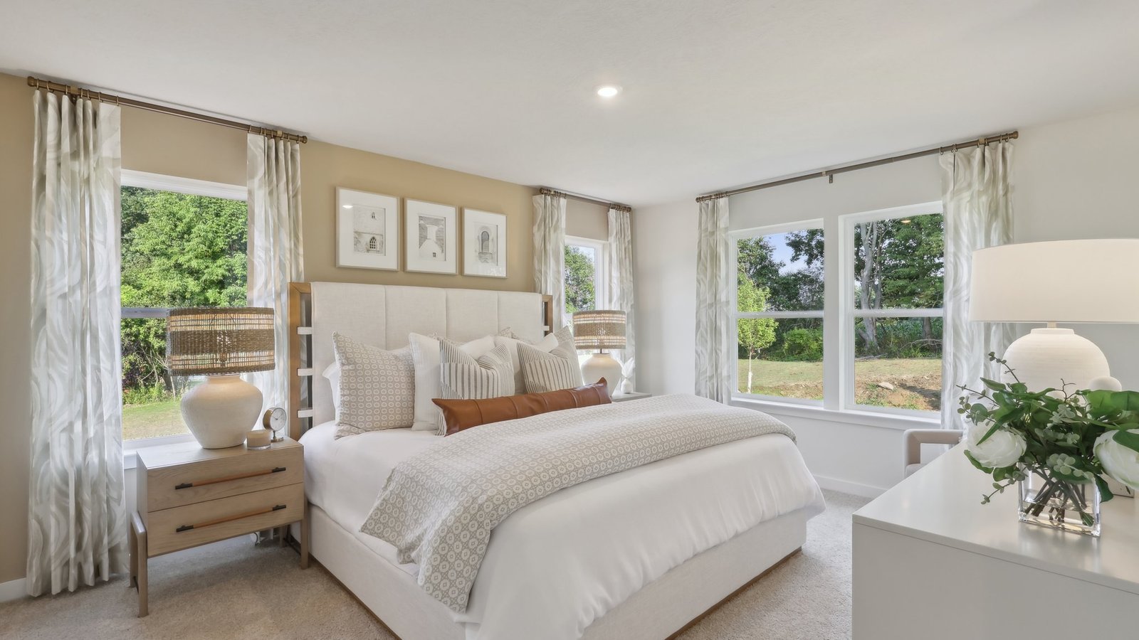 Primary bedroom with large window