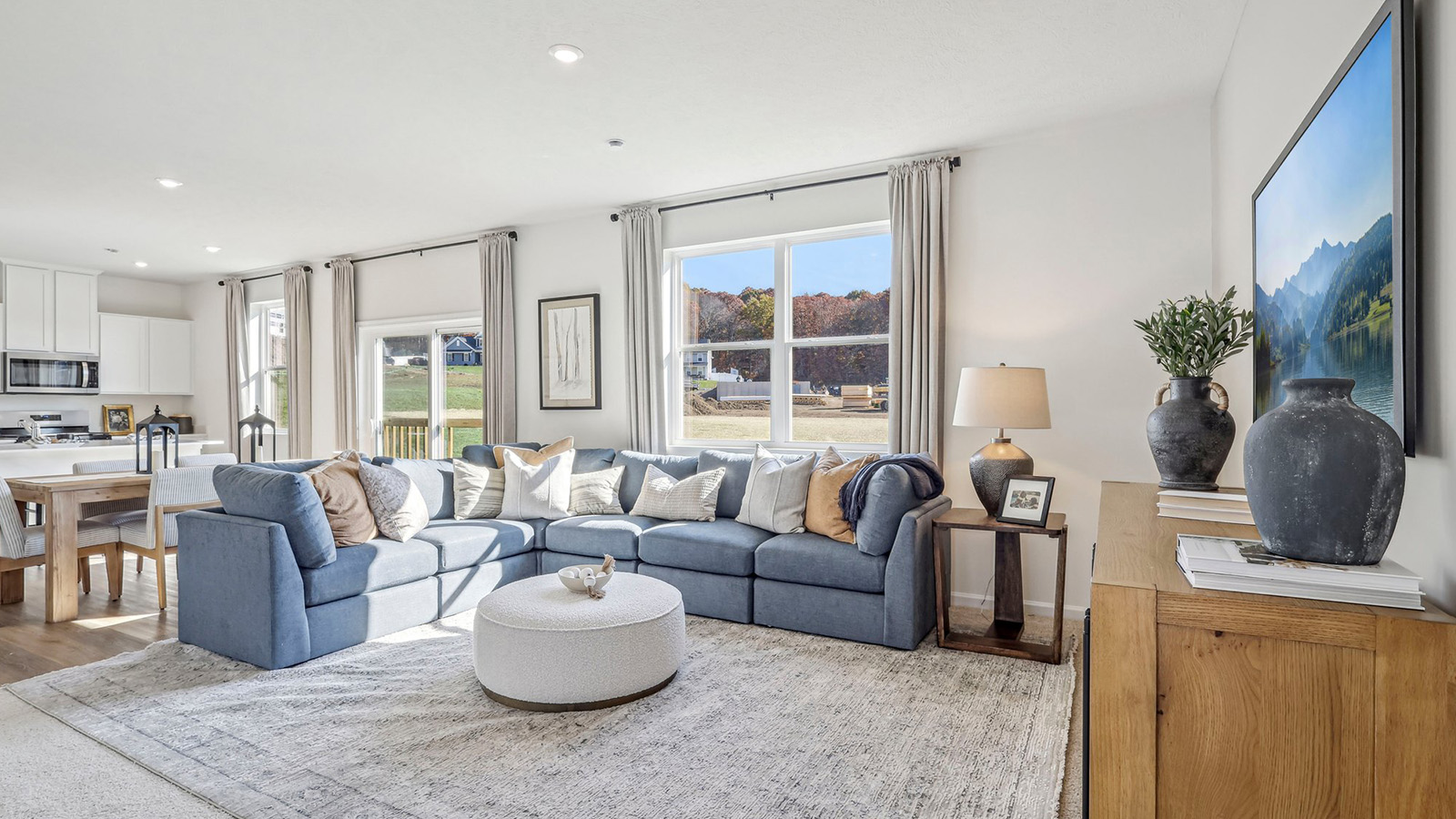 Living room with large windows off entry window