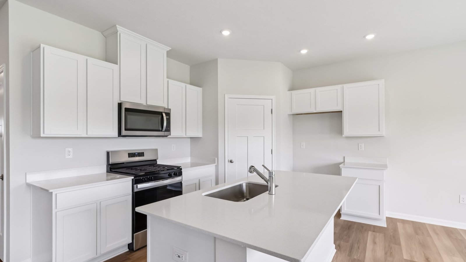 Kitchen area with stainless steel appliances