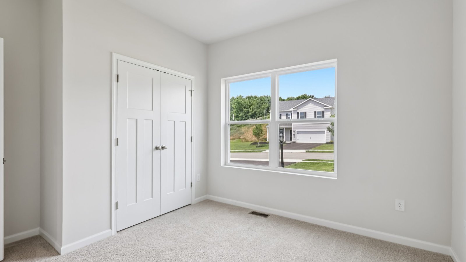 Secondary bedroom with large window