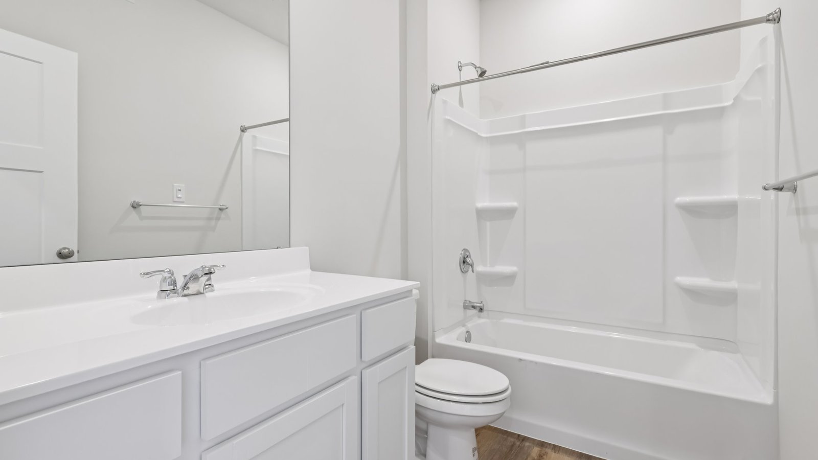 Secondary bathroom with white countertops