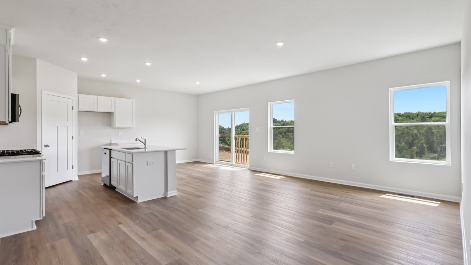 Main level living area with windows